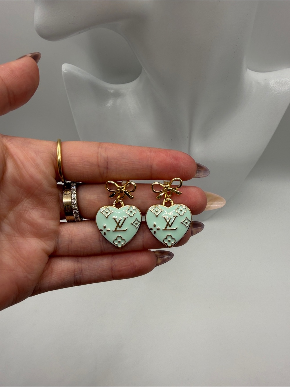 1495. Mint Green Heart Drop Earrings with Gold Bow Accent